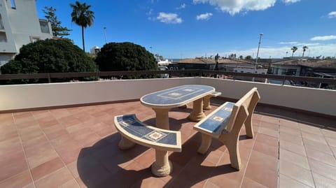 Cloud, Table, Sky, Property, Furniture, Azure, Outdoor Table, Outdoor Furniture, Tree, Wood
