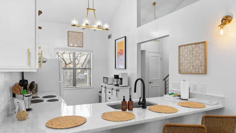 Whip up a grand meal or spread out your takeout feast in the spacious kitchen. 