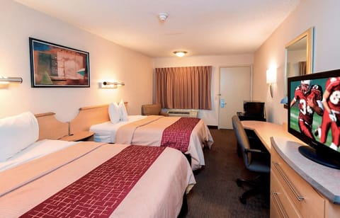 Unwind in a spacious double-room with cozy, crisp bedding.