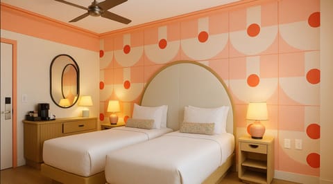 Drift off in a playful twin room with cozy designer lighting.