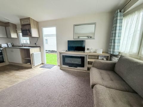 The living room is a truly versatile space, easily adapting to whatever your holiday mood requires