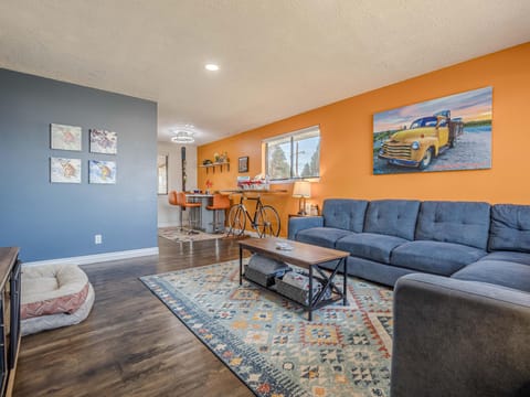 There's no shortage of comfortable spaces to relax - there's even a cozy bed for the dog!