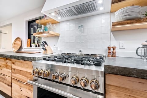 A chef’s dream kitchen with premium finishes, plenty of room to create memories