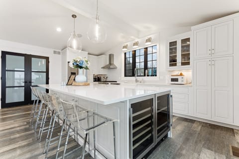 Gather around the island for a family snack. This kitchen has everything you need to keep everyone happy