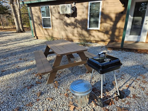 outdoor furniture and charcoal grill 