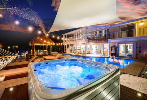 Experience Paradise in your own backyard with a luxurious hot tub by the beach with stunning views.