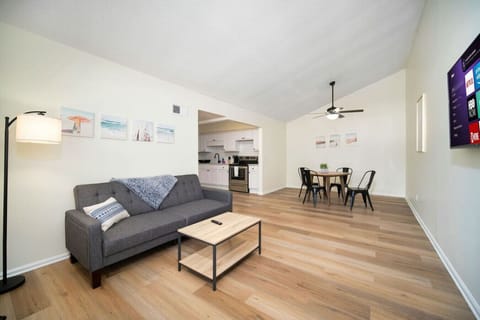 Bright and cozy space with a modern TV setup.