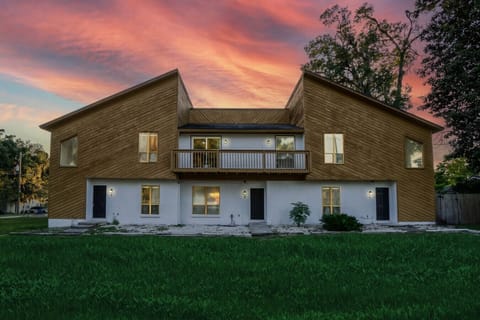 Stunning home exterior illuminated by the sunset.