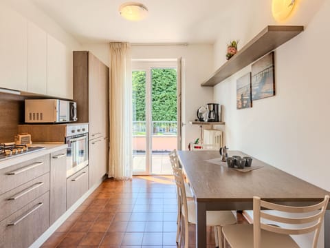 Furniture, Kitchen, Countertop, Flooring, Interior Design, Kitchen Appliance, Wood, Major Appliance, Cabinetry, Floor