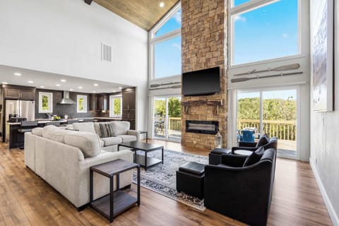 Curl up by the living room fireplace & stream your favorites on the smart TV