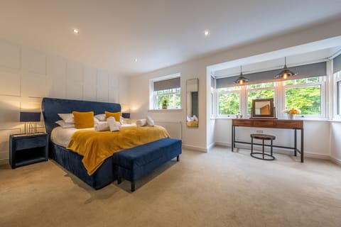 2b Harbord Road, Overstrand: Master bedroom with a king-size bed, Smart television and views from the front of the house