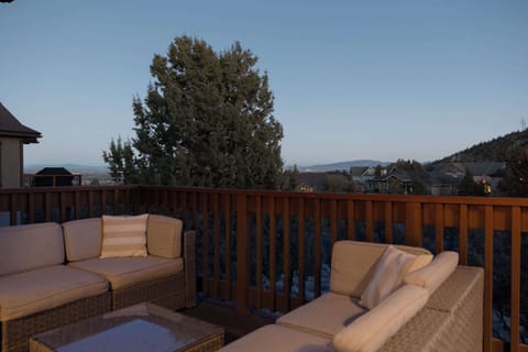 Lounge the day away or dine alfresco with mountain views on the deck
