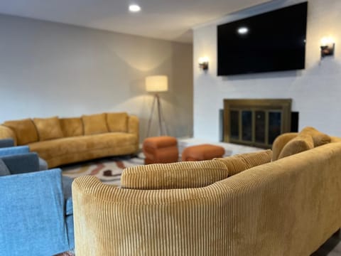 Spacious living area with a TV—great for relaxation and entertainment!