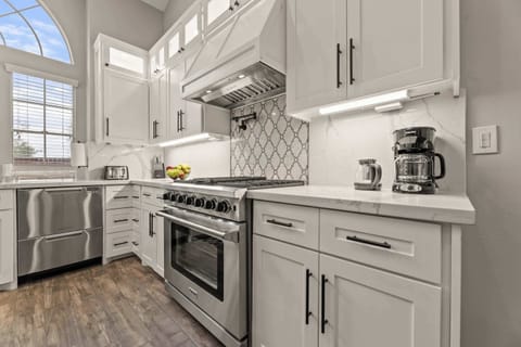 Large stove, coffee maker, toaster, and microwave