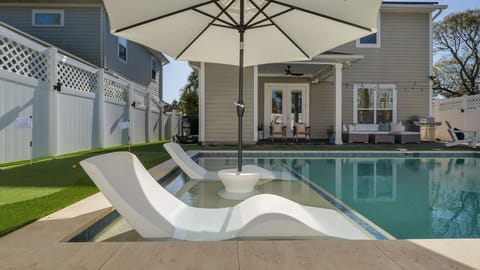 Take a refreshing dip in your private pool – the ultimate way to unwind by the beach