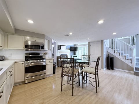 Fully equipped kitchen and dining table is great for a meal at home