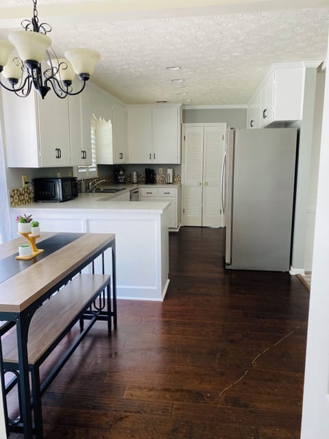 Full kitchen (microwave, stove, full size refrigerator, utensils) 