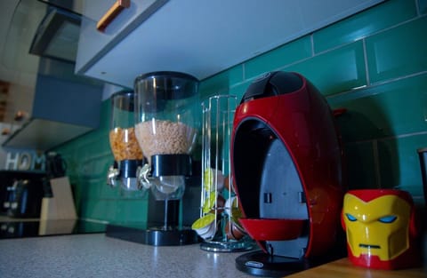 The kitchen also offers breakfast options, including a selection of cereals.