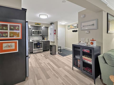 This is a game cabinet for inter. It has a lot of storage space and a large surface area. It's perfect for storing games, toys, and other items.