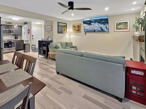 This home has an open floor plan, which means that the living room, dining room, and kitchen are all in one large room. This makes the home feel more spacious and allows for easy flow between the rooms.