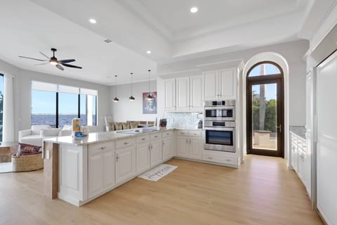 Cookware, dinnerware, many kitchen tools and small appliances are provided, including a Keurig coffee maker.