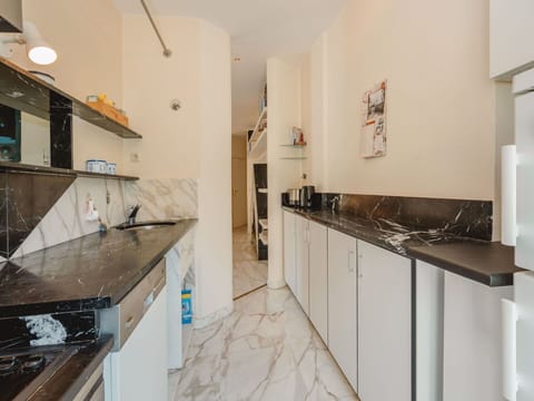 Flooring, Floor, Interior Design, Countertop, Kitchen, Apartment, Ceiling, Room, Cabinetry, Tile