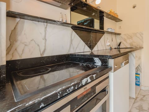 Kitchen, Countertop, Interior Design, Ceiling, Cabinetry, Kitchen Stove, Tile, Kitchen Appliance, Paint, Major Appliance