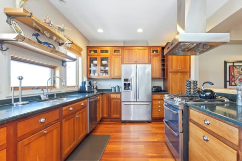 Fully equipped kitchen with seating at the bar