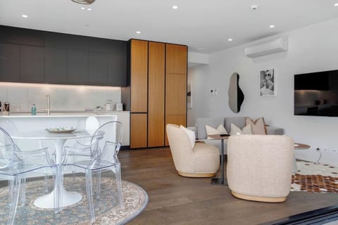 There is an air-conditioning unit that keeps you cool in Summer and warm in Winter.