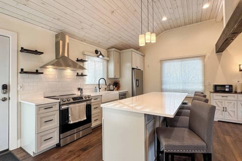 Open style kitchen with an island dining area