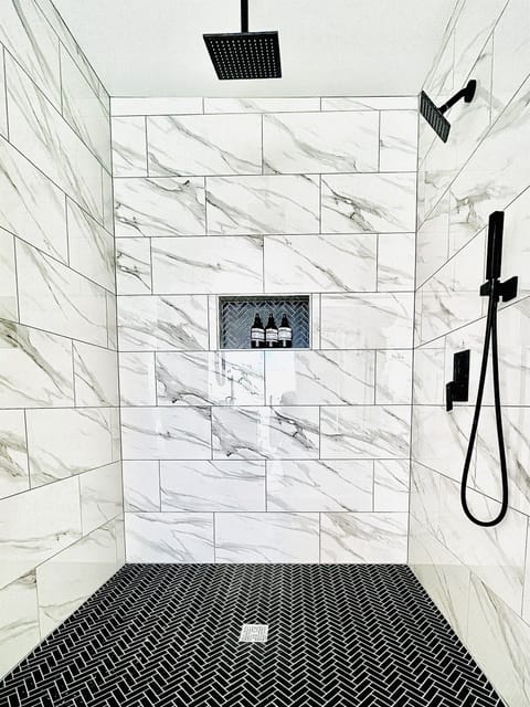Walk-in shower with rain shower head