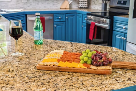Enjoy charcuterie nights with wine and friends in your gourmet kitchen.