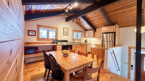 A warm and inviting dining area with a rustic wooden vibe.