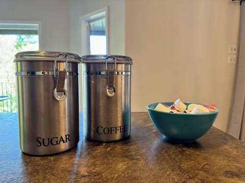 Complimentary coffee, cream, and sugar provided with drip coffee maker