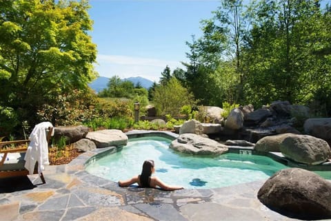 Unwind at the Skamania Lodge outdoor spa, surrounded by nature's beauty.