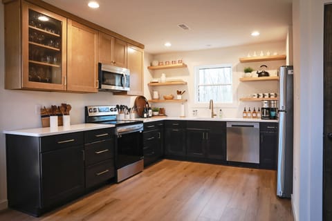 Chef's kitchen with ample space for many hands to work together for meal prep.