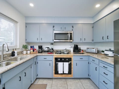 Fully equipped kitchen with brand new, modern appliances 