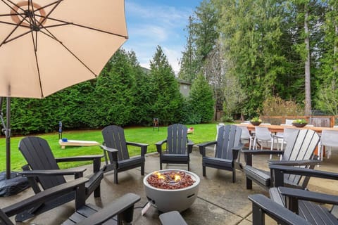 Enjoy outdoor seating and two firepits for your full group in the private spacious backyard oasis!