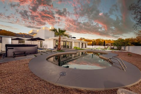 Main House: Spacious backyard with private pool and hot tub ($80 daily fee to heat pool; no additional fee for hot tub heating)