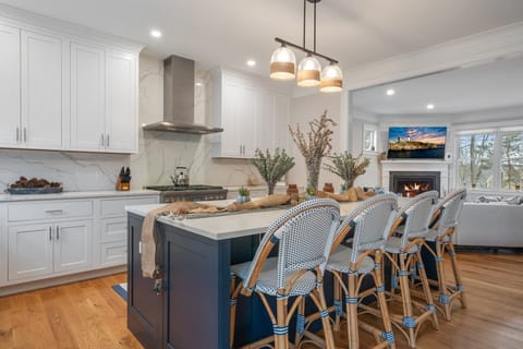 Start your mornings right at the comfy kitchen island with seating for four.