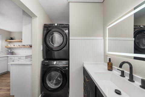 Our home has a full-size washer and dryer and laundry detergent is provided.