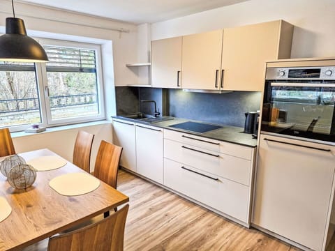 Kitchen, Kitchen Appliance, Countertop, Cabinetry, Major Appliance, Flooring, Interior Design, Furniture, Wood, Floor