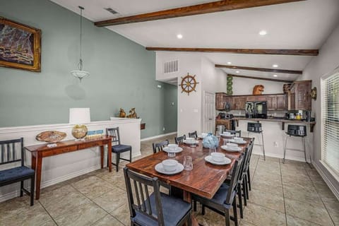 Seamless living, dining, and kitchen space.