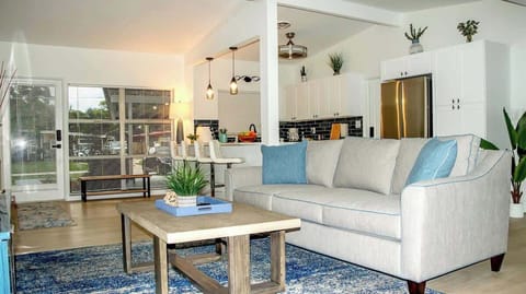 Bright living room with a cozy vibe, offering plenty of space to relax or entertain guests.
