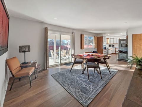 Spacious dining room leading to back covered patio