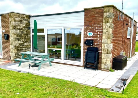 Two recliners plus 6-seater outdoor dining table