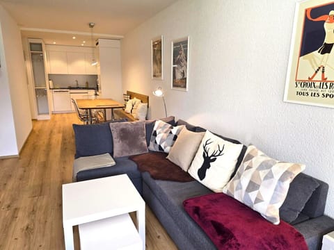 Furniture, Interior Design, Flooring, Floor, Couch, Wall, Wood, Room, Wood Flooring, Living Room