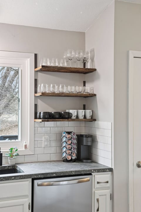 Coffee bar area - Kcups provided. 10 cup coffee pot, grinder and Bodum as well