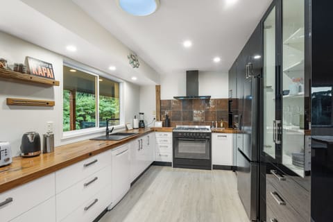 Recently renovated kitchen with plenty of bench space and huge 90cm oven