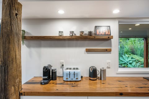 Coffee supplies provided including Nespresso pods, ground coffee and brown sugar